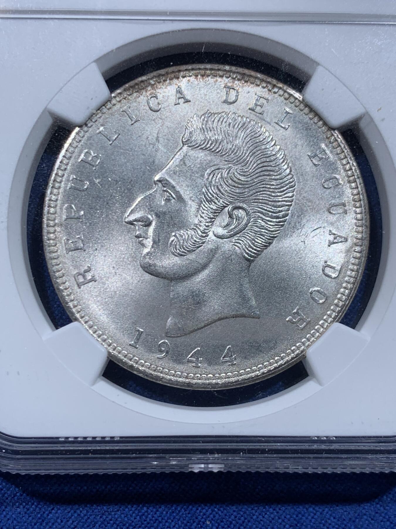 《竞宝斋》第446场 周日，周一，2场连拍 （全场包邮） NGC MS63 厄瓜多尔1944年5苏克雷银币，墨西哥铸造，转光强烈细节优秀，状态极佳。