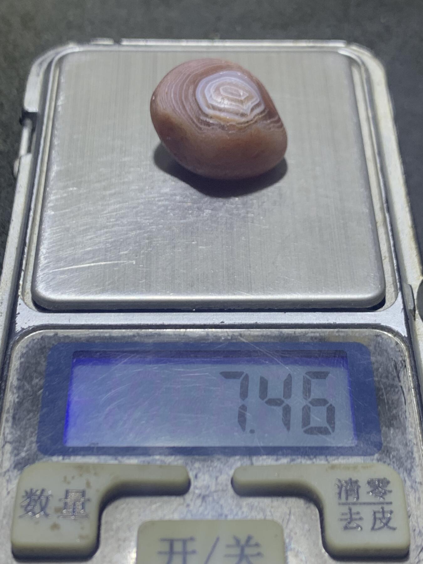 精美天眼纹水冲籽川料南红玛瑙原石一颗，