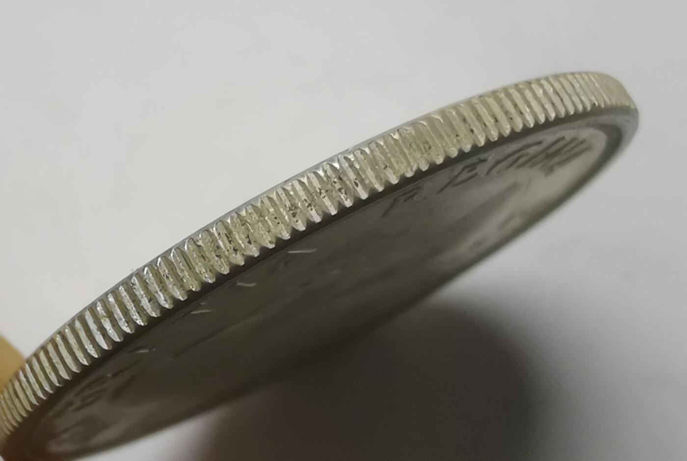 巨藏钱币第七期硬币场12月12号20点开拍 加拿大1964年50分银币11.5克