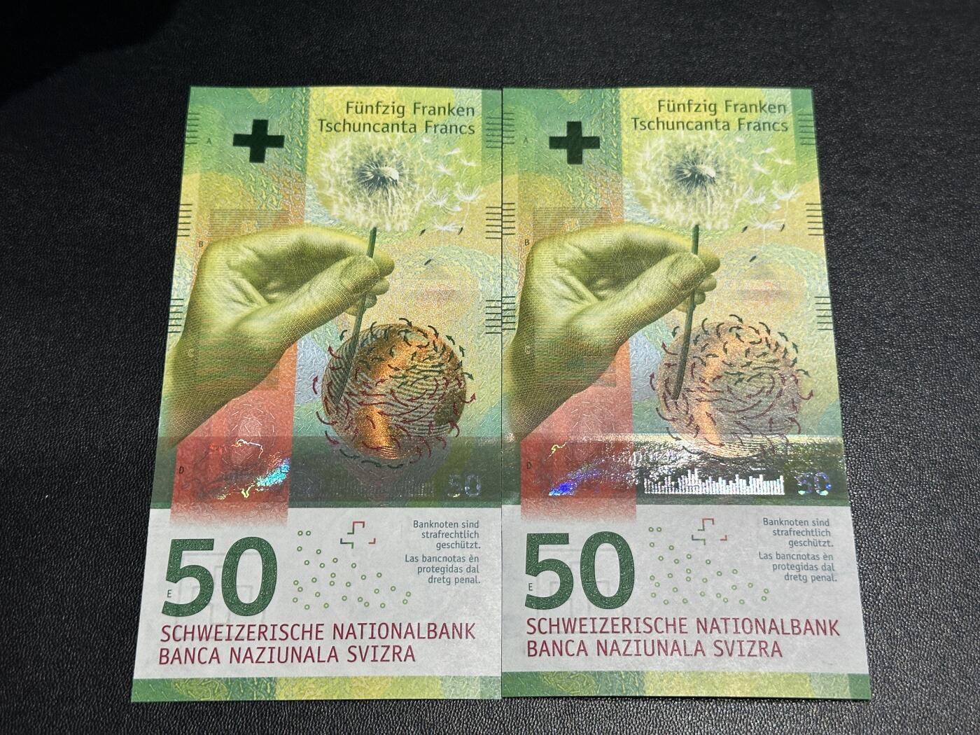 《外钞收藏家》第五百九十二期（精选场）（本平台长期征集拍品、欢迎藏友们联系合作） 瑞士2020年手版50法郎2张相同号码（凑齐不易，绝品）	绝品