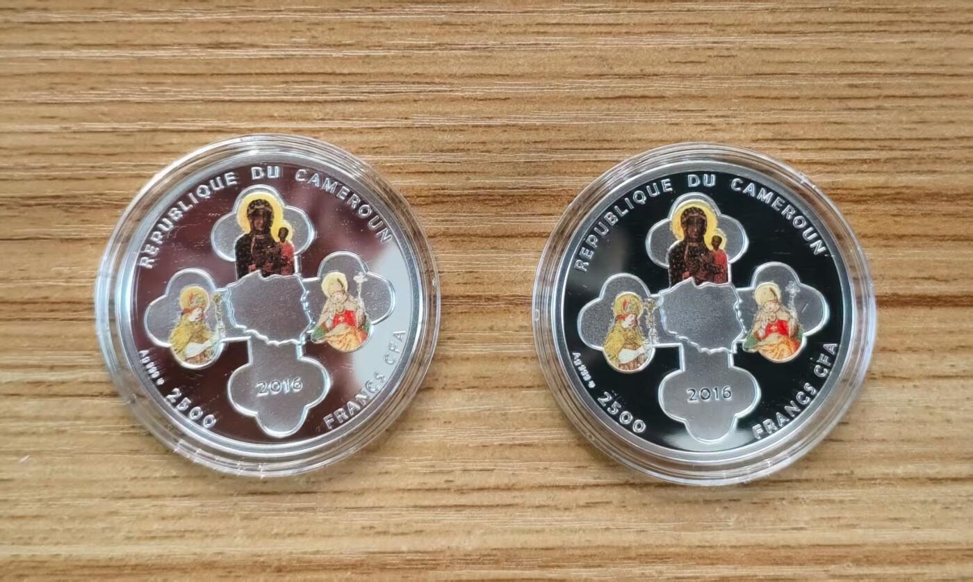 第184期拍卖 喀麦隆2016年，基督教世界青年节套装-世界青年日(波兰克拉科夫)+世界青年会议(波兰莱德尼察), 两枚完整全套装. 彩色精制纪念银币. 盒证全.(此套装共2枚,两枚币彩色面图案相同，非彩色面图案不同). 少见稀有漂亮银币套装. 实物超级精美漂亮. 国外售价315+美元.