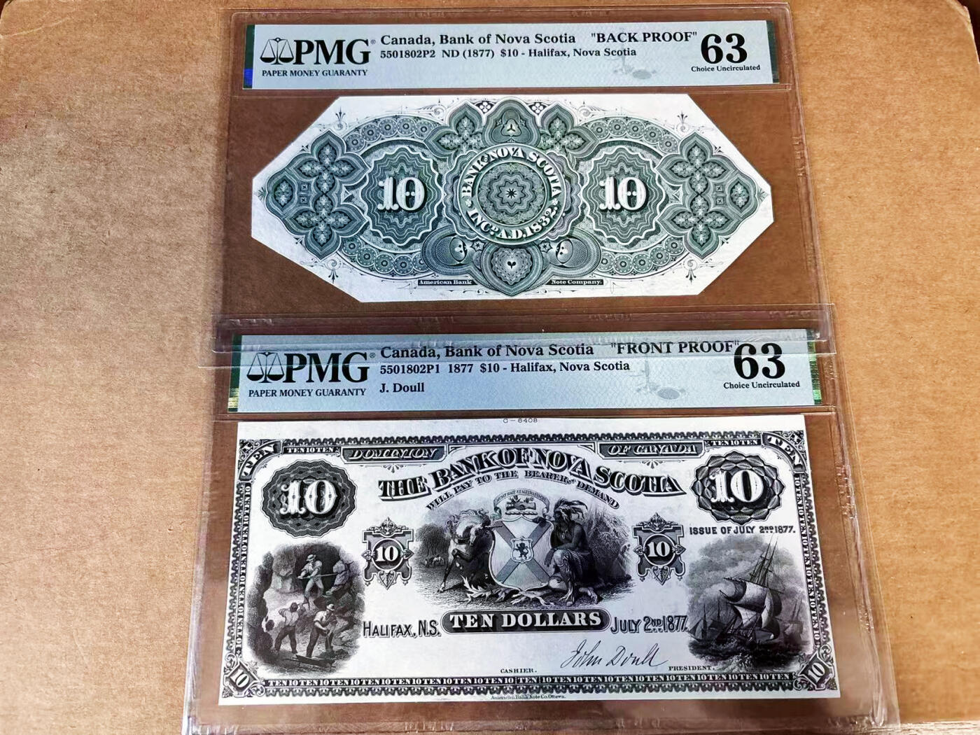 【Blue Auction】世界纸币精拍第760期——18级TOP拍卖/信誉/品质/专业/高效💫 【唯一冠军 唯一记录 正背面PROOF一对 含签名】加拿大丰业银行1877年10元 纹章中独角兽和圣安德鲁十字源自1625年苏格兰王室查理一世对这片土地宣誓主权 矿工、印第安人和哈利法克斯港风暴中的航船象征征服自然 雕刻精细 该银行属加拿大五大行之一 PMG63 