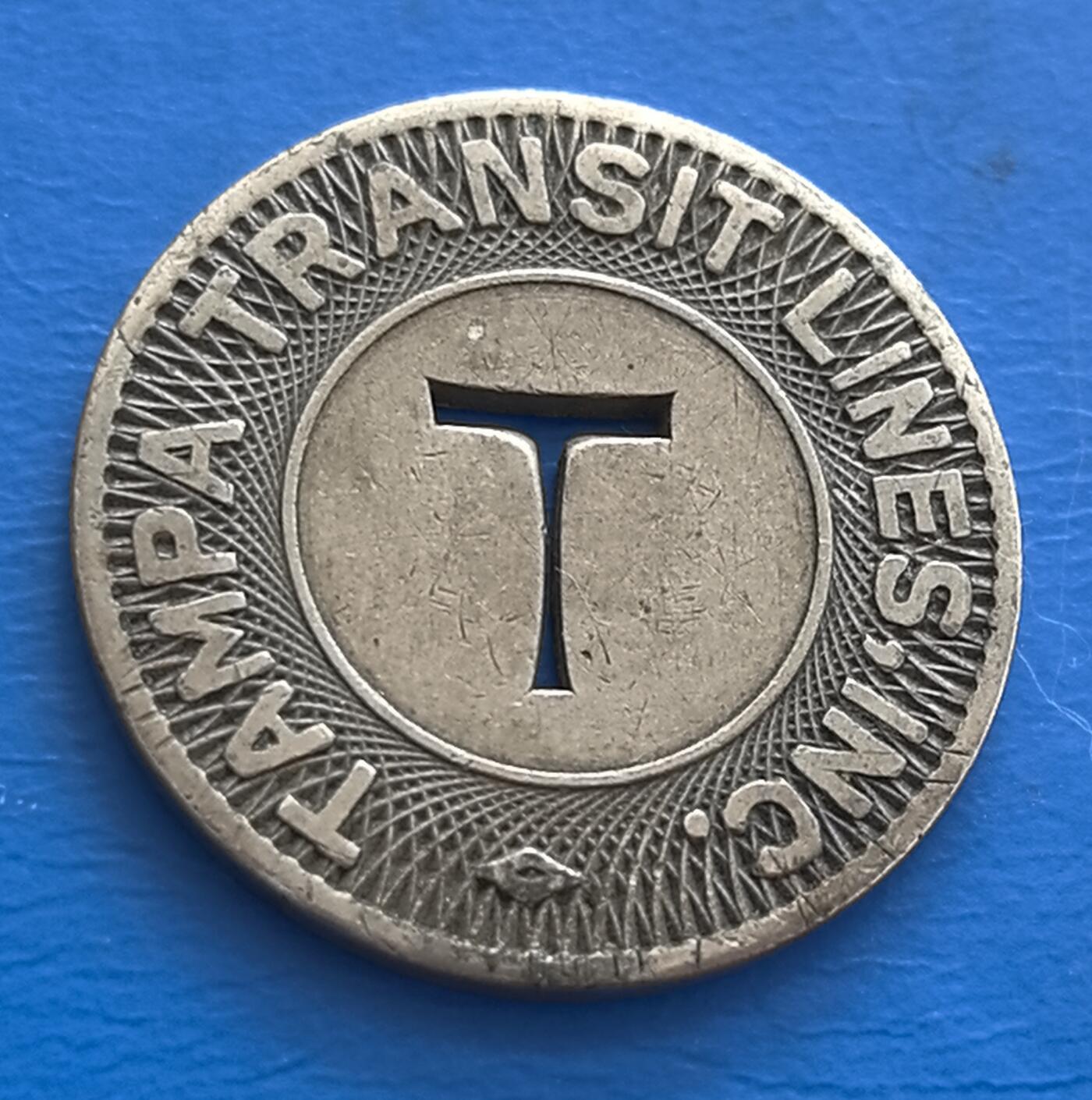 美国佛罗里达州坦帕市1948年公交代用币，直径22.6mm，仅在坦帕市流通，稀缺性远超全国性货币，是研究坦帕地方交通史、城市发展的“