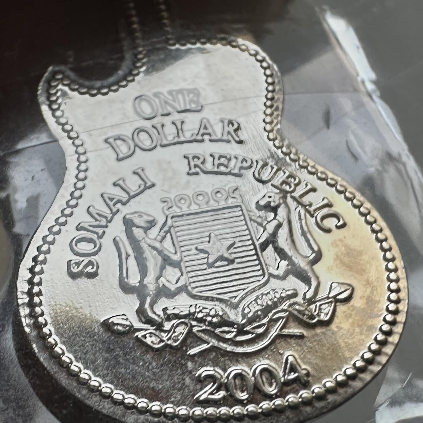 🌹外币初藏🌹🐯2025年第139场  每周二四六晚8️⃣点 接代拍 索马里2004年¥1吉他异形纪念币 少见