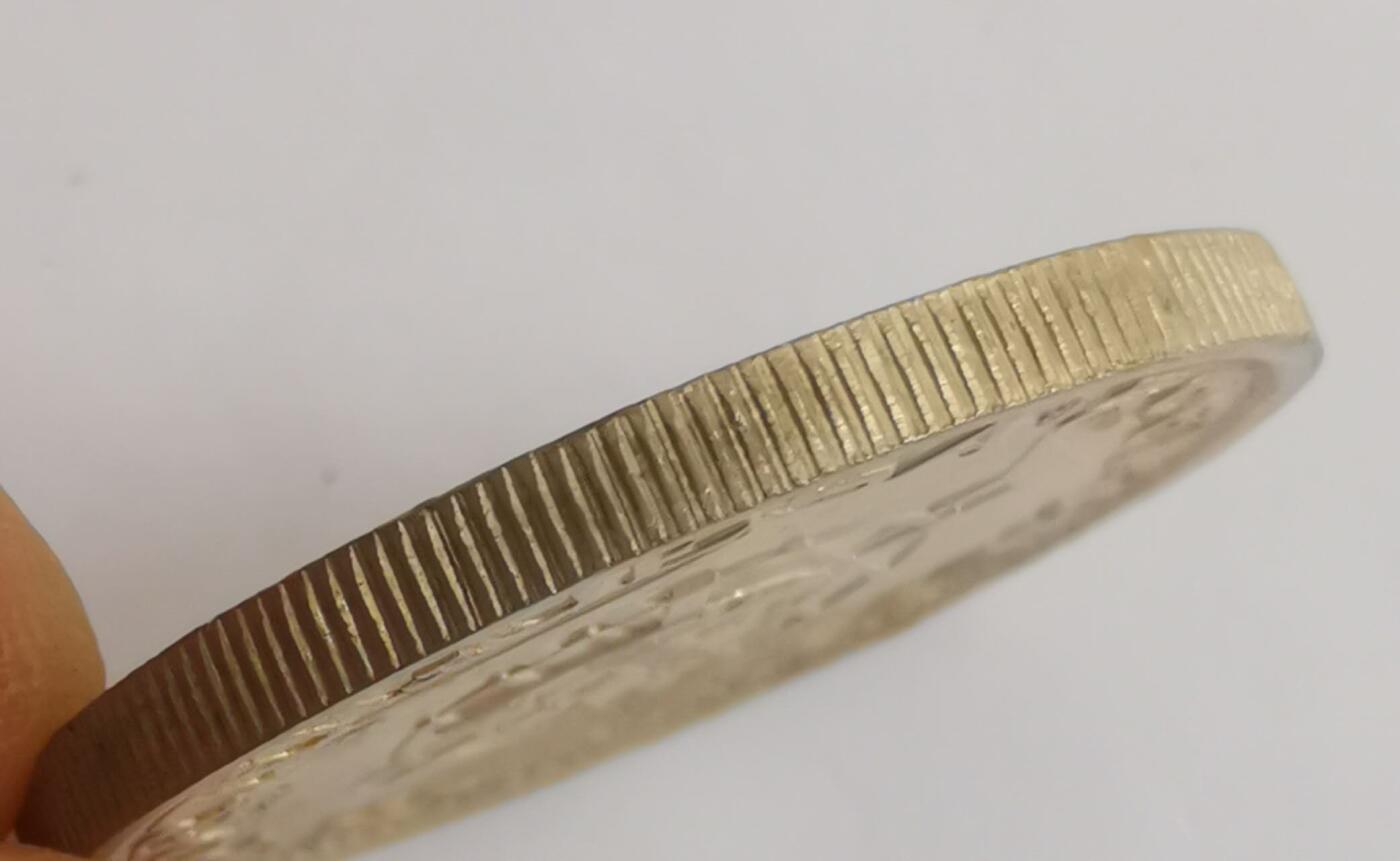 巨藏钱币第七期硬币场12月12号20点开拍 澳门1952年5元15克银币原光品