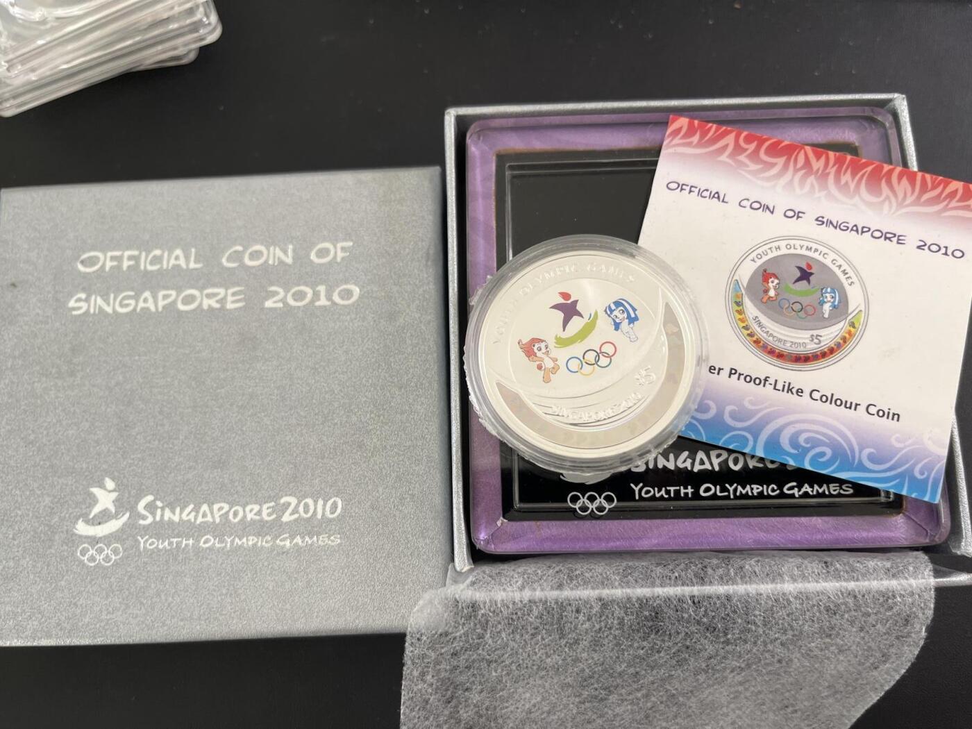 ❤️【币观天下】❤️ 第334期钱币拍卖- 2025.12.12周五晚上6点半场-长期征集拍品 新加坡2010年世界青年运动会纪念银币