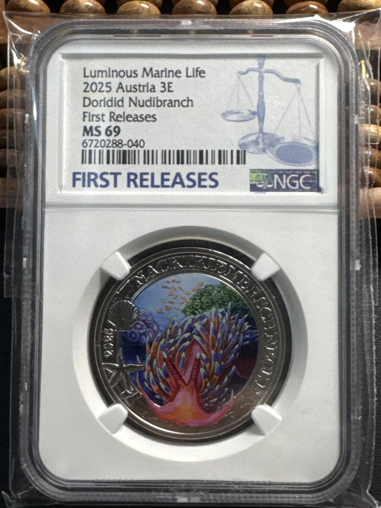 ❤️【币观天下】❤️ 第334期钱币拍卖- 2025.12.12周五晚上6点半场-长期征集拍品 奥地利2025年海洋生物海蛞蝓彩色夜光纪念币NGC评级首期69分