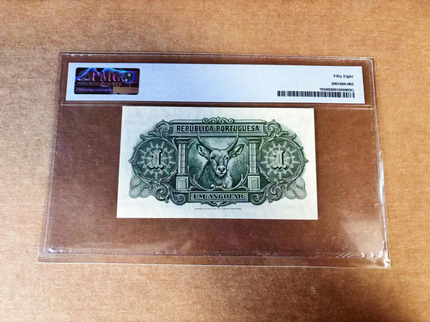 【Blue Auction】世界纸币精拍第760期——18级TOP拍卖/信誉/品质/专业/高效💫 【葡萄牙统治300周年纪念钞 A冠】安哥拉1948年1安哥拉 殖民者登陆与水羚 本版发行未能起到强化精神剥削的效果 反而激起抵抗运动 葡萄牙被迫在1951年承认安哥拉为海外省 PMG58 名家旧藏