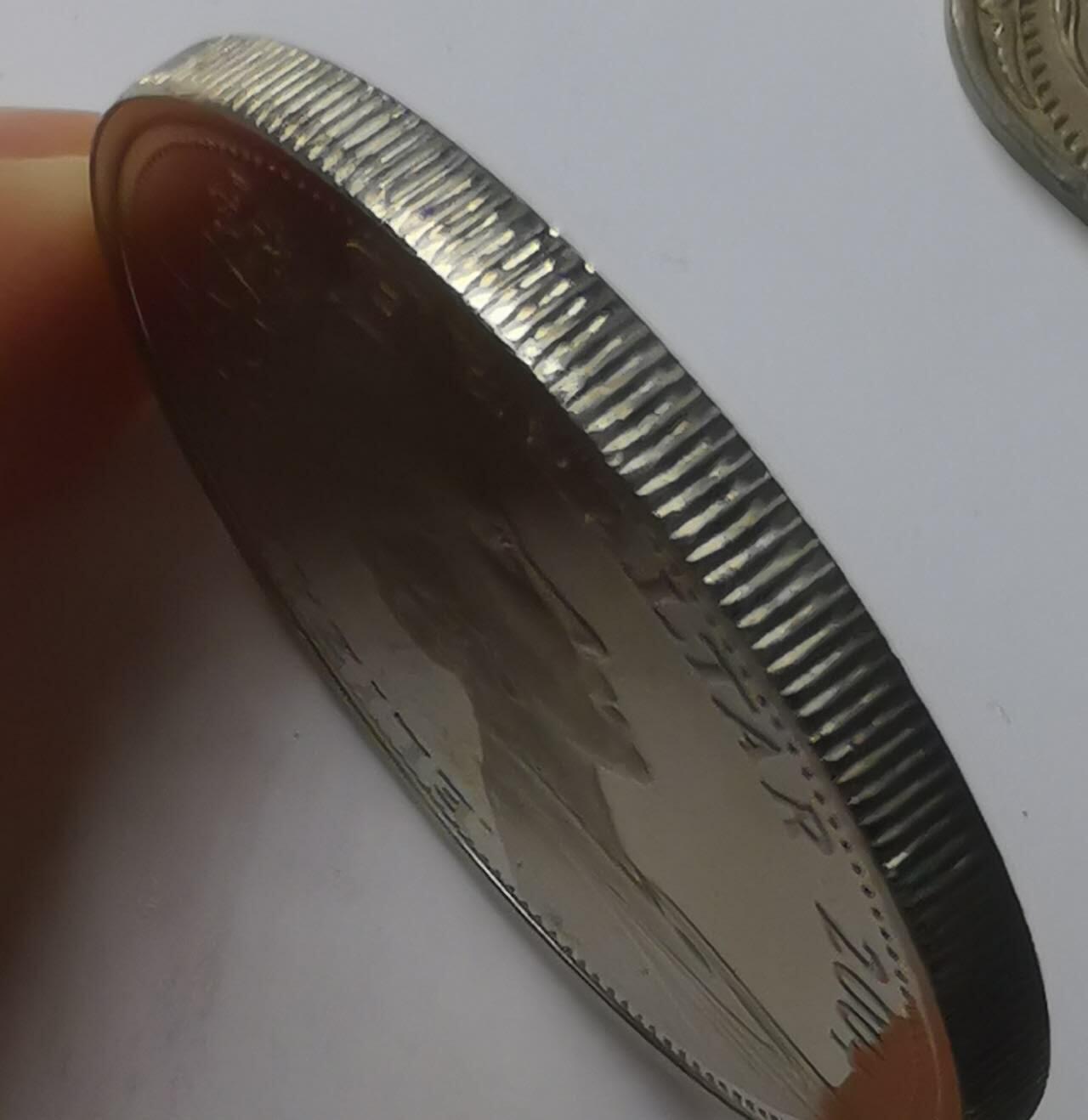 巨藏钱币第七期硬币场12月12号20点开拍 直布罗陀2004年1克朗精制镍币35mm上下