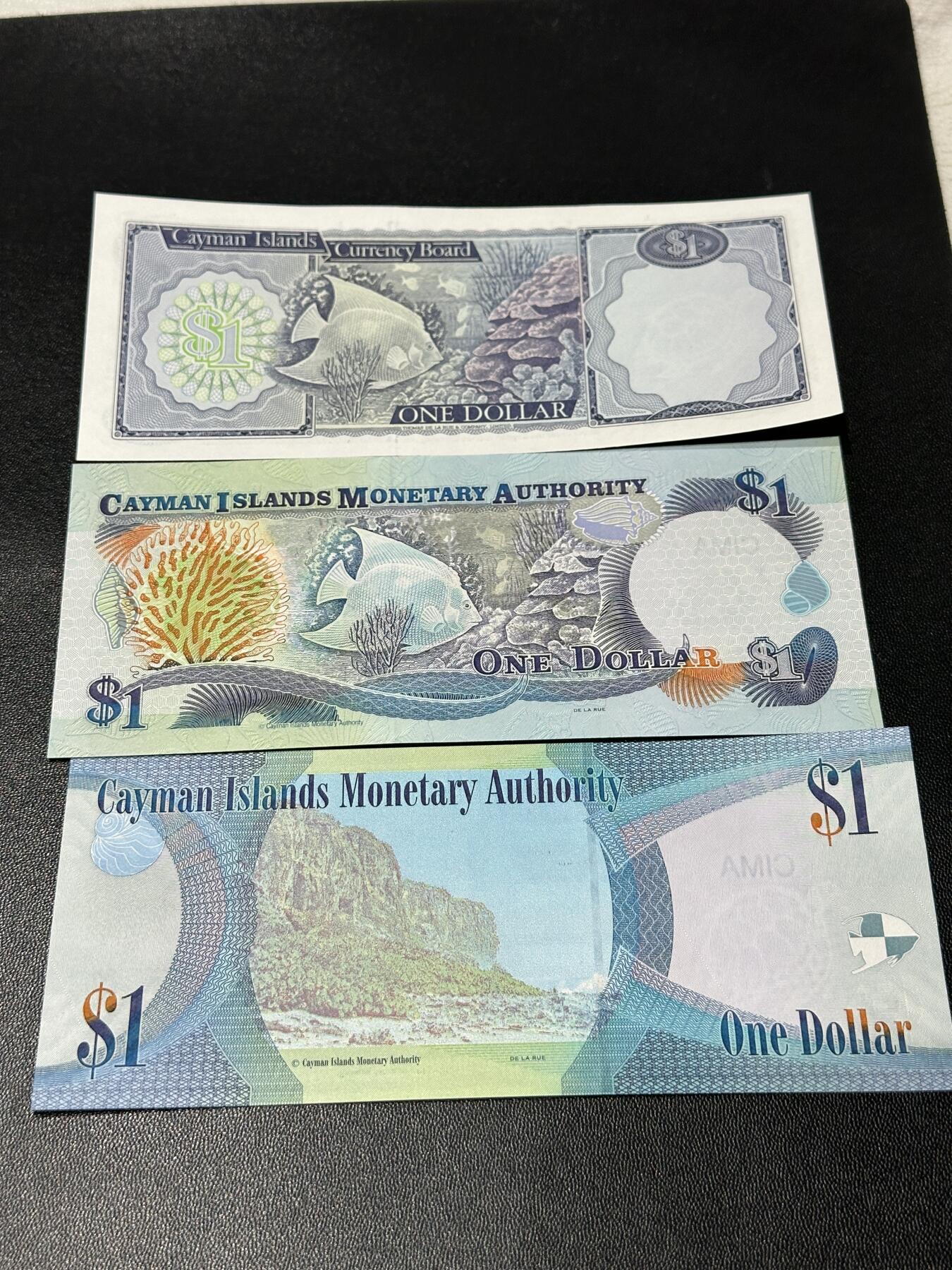 《外钞收藏家》第五百九十二期（精选场）（本平台长期征集拍品、欢迎藏友们联系合作） 开曼群岛1974+2001+2010年1元三张不同版本（三种女王头像）	UNC