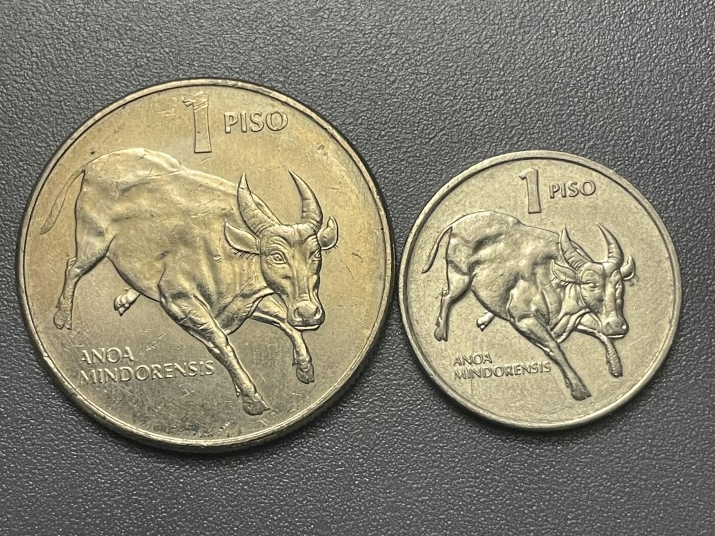 回流1215 菲律宾1985、1994年大小1比索 濒危野生动物-民都洛水牛