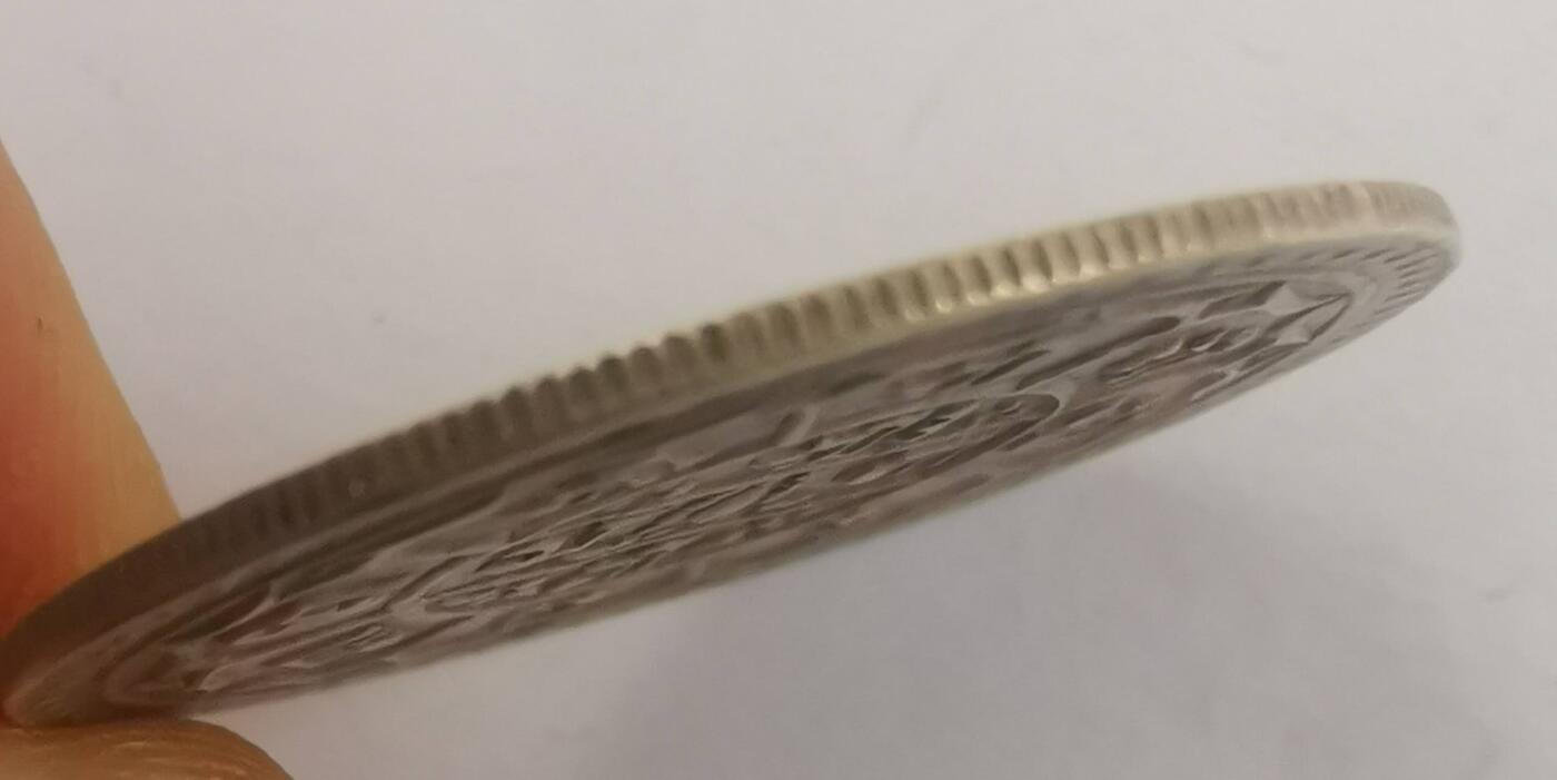 巨藏钱币第七期硬币场12月12号20点开拍 尼泊尔早期1莫哈银币27mm5.4克