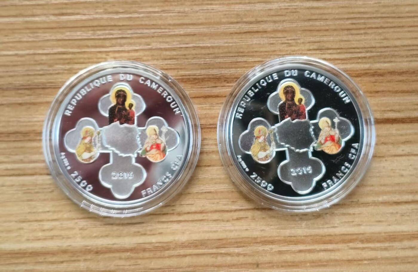 第184期拍卖 喀麦隆2016年，基督教世界青年节套装-世界青年日(波兰克拉科夫)+世界青年会议(波兰莱德尼察), 两枚完整全套装. 彩色精制纪念银币. 盒证全.(此套装共2枚,两枚币彩色面图案相同，非彩色面图案不同). 少见稀有漂亮银币套装. 实物超级精美漂亮. 国外售价315+美元.
