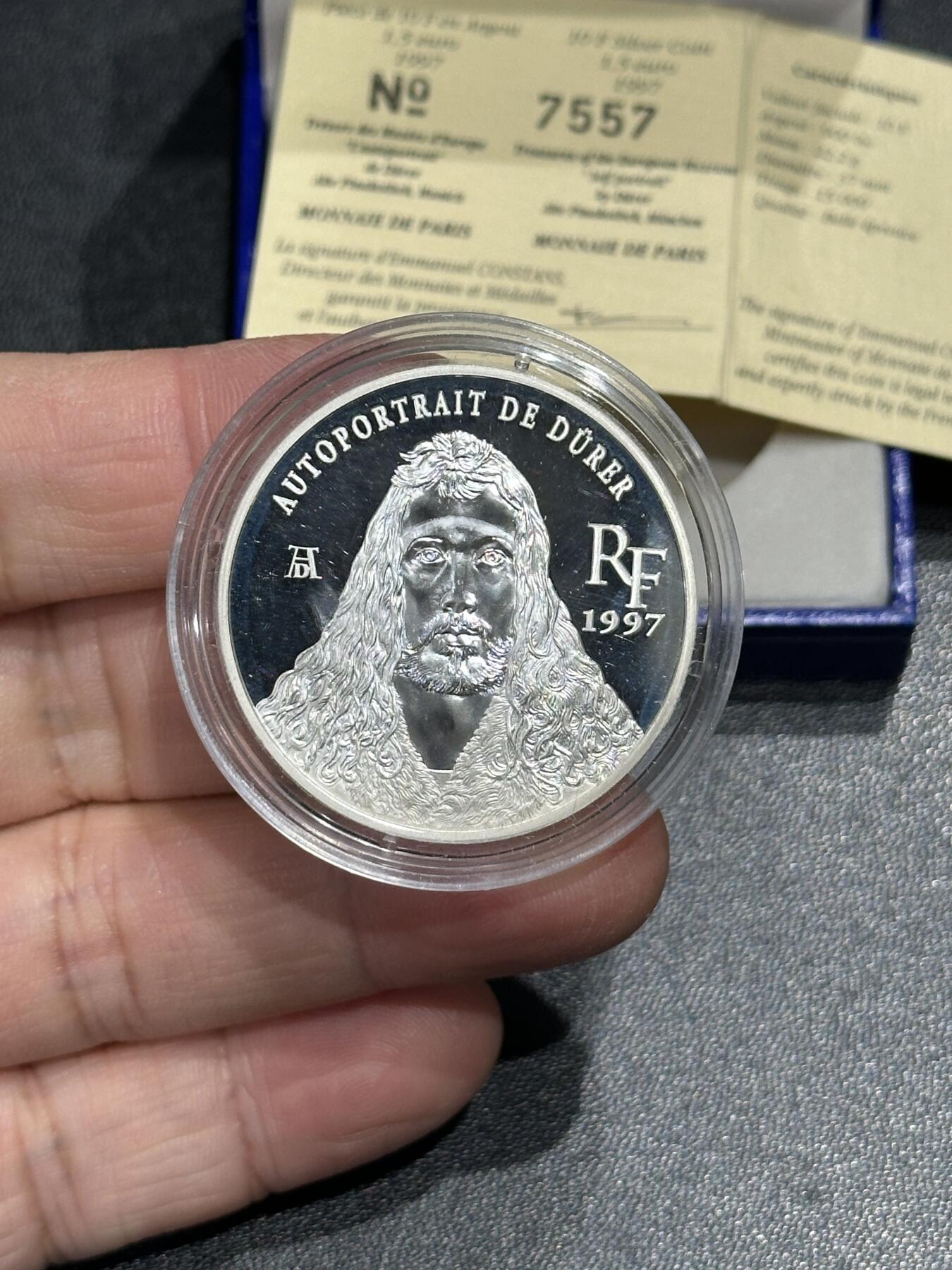 《外钞收藏家》第五百九十二期（精选场）（本平台长期征集拍品、欢迎藏友们联系合作） 法国1997年卢浮宫系列10法郎双面值精制PROOF银币（画家丢勒，22g，925银；盒证齐全）