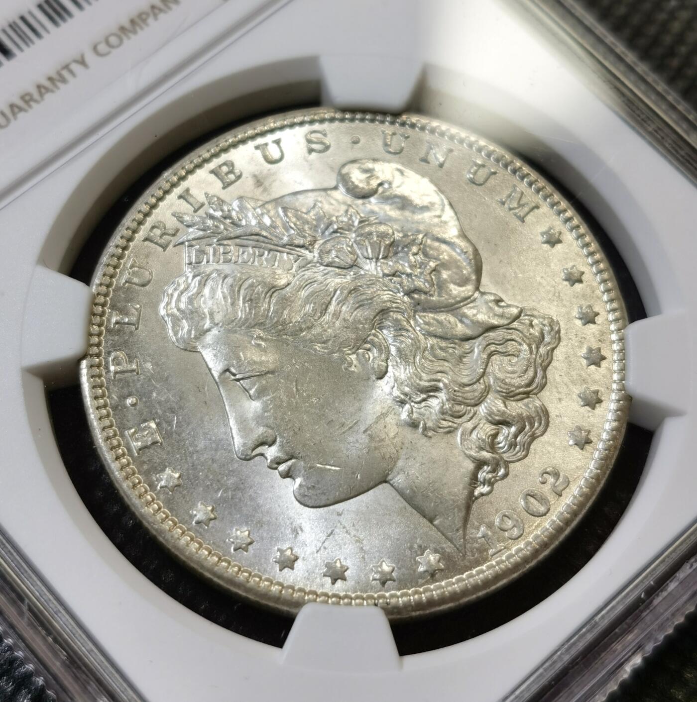 甄臻铺-世界币章拍卖（第43期）送拍享返佣金等优惠多多 NGC-MS64 美国1902年O版摩根一元银币