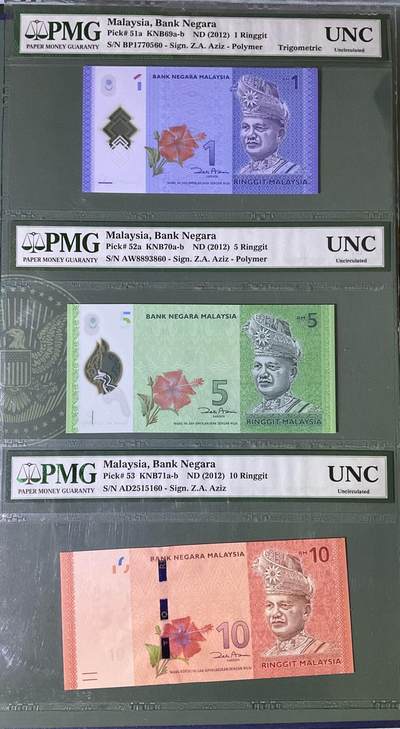 【礼羽收藏】🌏世界钱币拍卖第115期 - pMG马来西亚1-5-10元一体壳，稀少小全套首发年全首签名 ，帶英文标注，12年老壳用于马来官方宣传用途数量非常稀见，注:画红圈处反面有一小开口