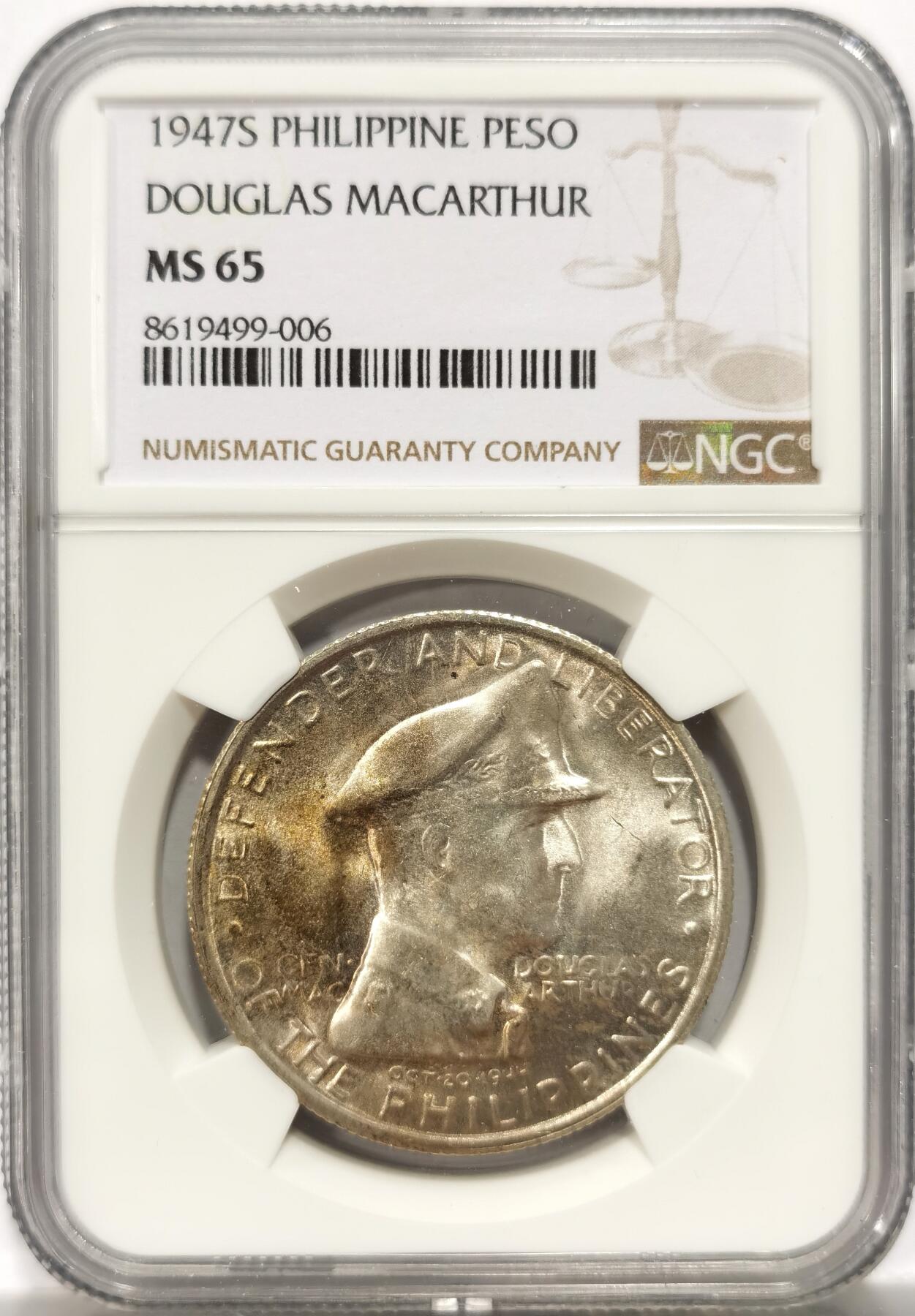博洋堂世界钱币拍卖第151期（全场包邮） NGC MS65 1947年菲律宾麦克阿瑟纪念1比索大银币，双面车轮转光，带漂亮淡彩，该品种带彩少见。