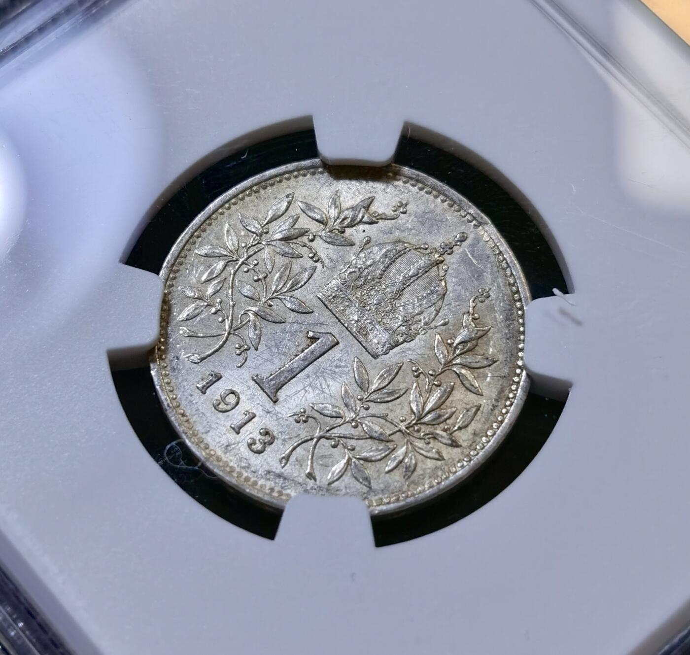 甄臻铺-世界币章拍卖（第43期）送拍享返佣金等优惠多多 NGC-UNCD 奥匈帝国一科罗娜银币，转光强烈，未流通好品相，看不出哪里有大问题