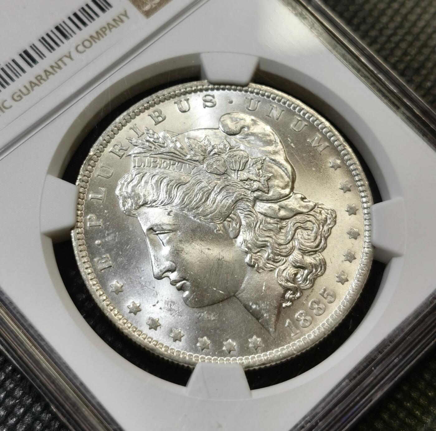 甄臻铺-世界币章拍卖（第43期）送拍享返佣金等优惠多多 NGC-MS64 美国1885年O版摩根一元银币