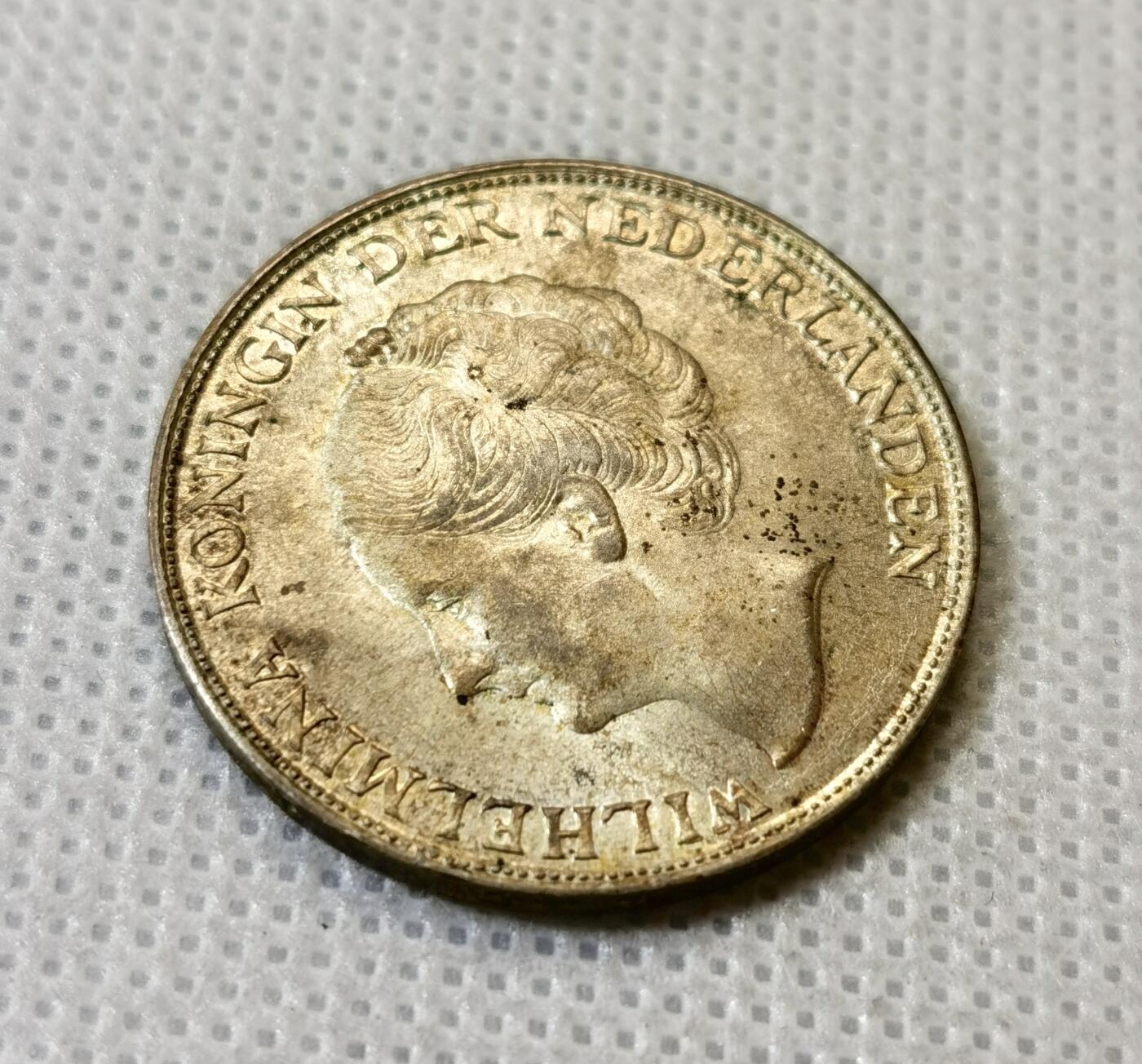 甄臻铺-世界币章拍卖（第43期）送拍享返佣金等优惠多多 UNC 荷属东印度1943年1盾银币 绝美黄油转光，细节见图