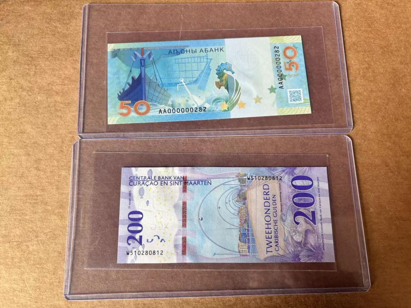 【Blue Auction】世界纸币精拍第761期——18级TOP拍卖/信誉/品质/专业/高效💫 【一组2张无47 含AA冠小号】阿布哈兹 2025年10阿沙&库拉索 2025年200盾 全新UNC