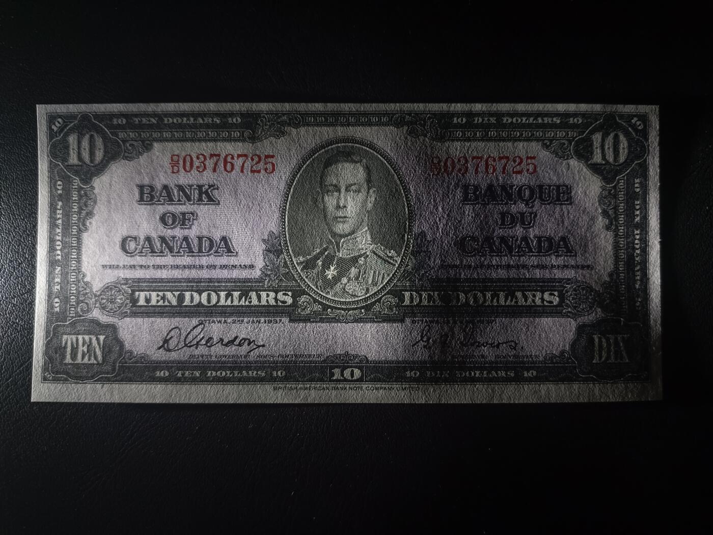 2025十二月第三期，总208期 加拿大1937版10元UNC-，乔治六世国王和商业神墨丘利，稀有中高面值品种