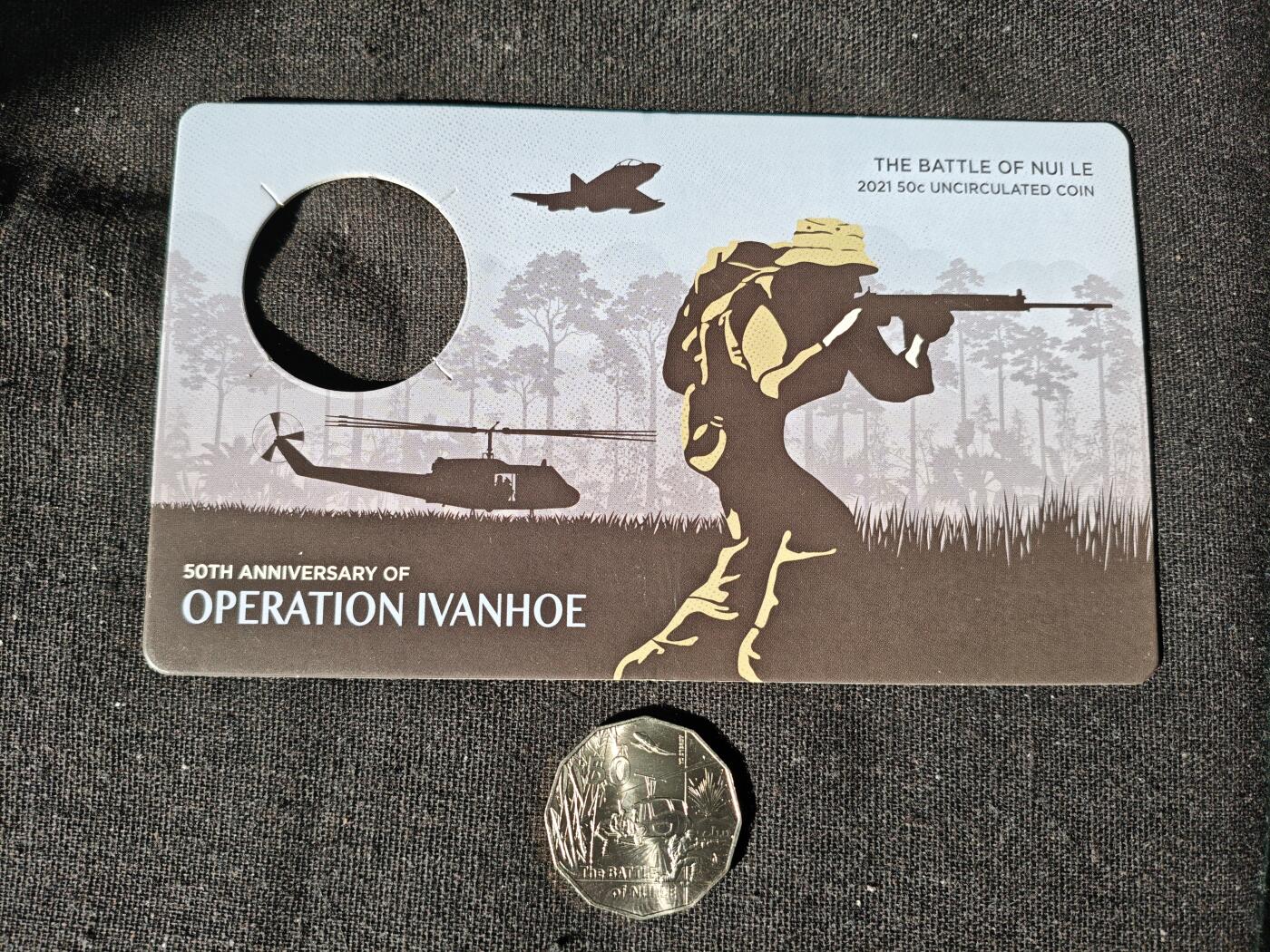 刘世昌艺术品销售中心～虎踞龙蟠*金杨在线联拍群第511期 澳大利亚2021年“越战之努伊勒战役”50周年纪念币及卡册1枚，品相如图。