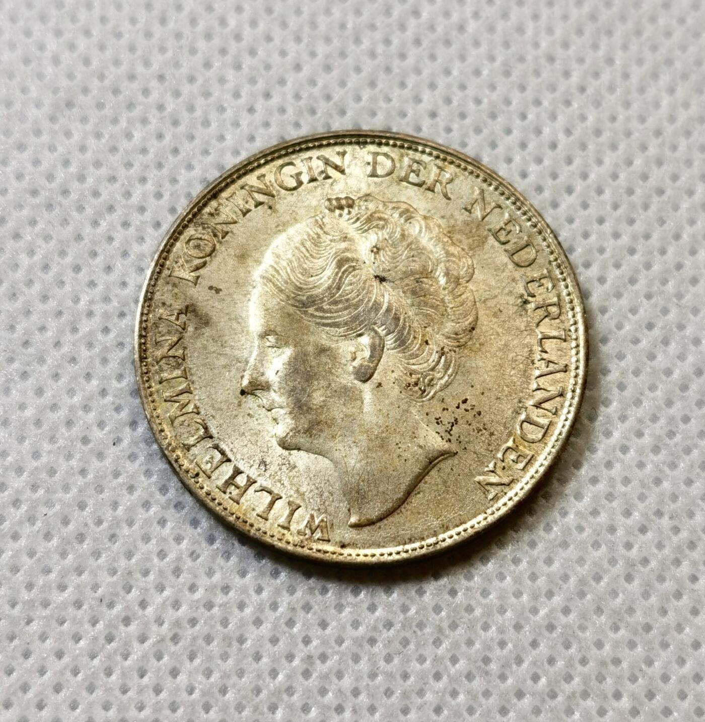 甄臻铺-世界币章拍卖（第43期）送拍享返佣金等优惠多多 UNC 荷属东印度1943年1盾银币 绝美黄油转光，细节见图