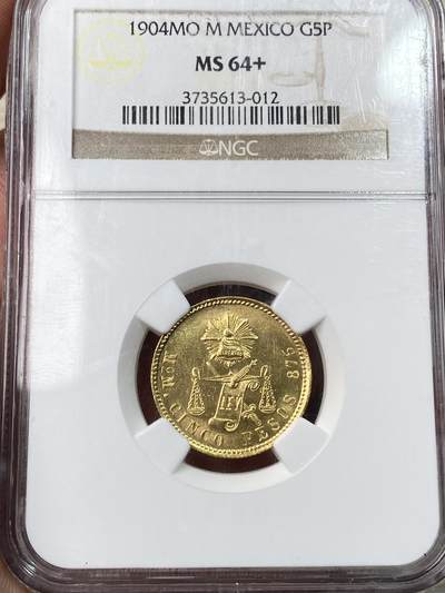 万国钱币拍卖第057期（万国冬季大拍） - NGC MS64+ 1904年墨西哥天平鹰5比索金币 发行量仅有1415枚的墨西哥天平鹰金币 墨西哥城造币厂铸造 全深打车轮金光顶级BU品质 潜力品种 8.46G 875金