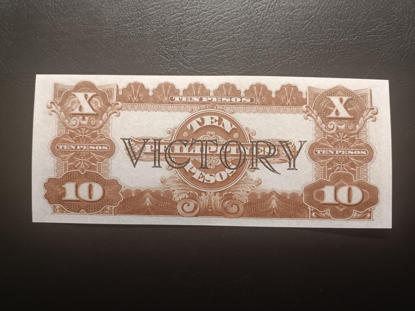 2025十二月第三期，总208期 菲律宾国民银行1944版10比索UNC-，菲律宾光复后在旧有钞票上加盖“胜利”字样，华盛顿侧像，浓厚的美国钞票风格，中高面值印刷较为稀有