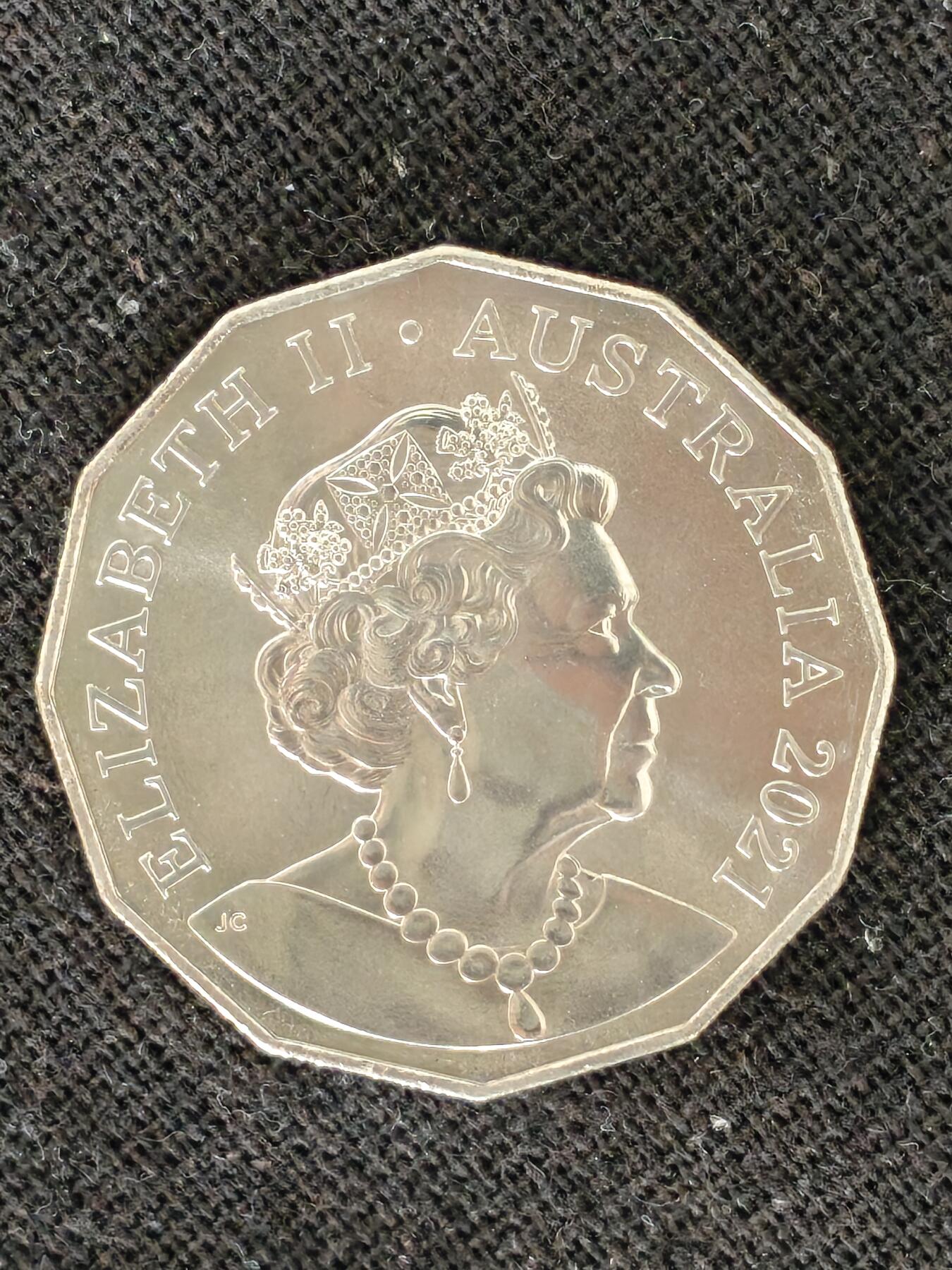 刘世昌艺术品销售中心～虎踞龙蟠*金杨在线联拍群第511期 澳大利亚2021年“越战之努伊勒战役”50周年纪念币及卡册1枚，品相如图。