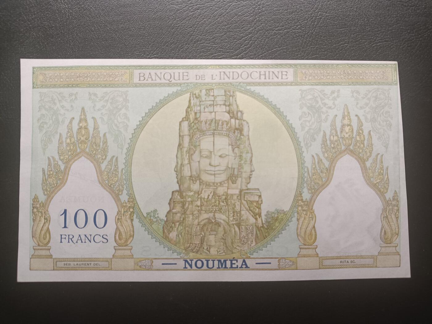 2025十二月第三期，总208期 法属太平洋-新喀里多尼亚1953版100法郎AUNC边不齐，加盖首府努美阿地名，法国人格化象征玛丽安娜和四面佛塔