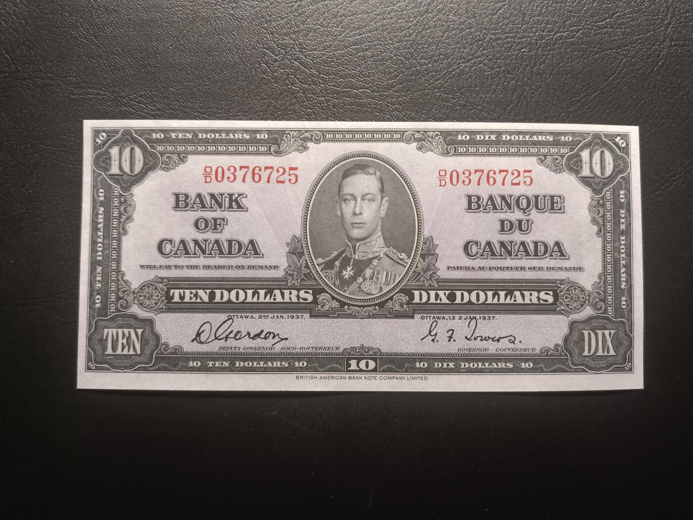 2025十二月第三期，总208期 加拿大1937版10元UNC-，乔治六世国王和商业神墨丘利，稀有中高面值品种