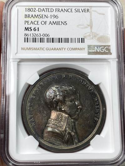 万国钱币拍卖第057期（万国冬季大拍） - NGC MS61 1802年法国拿破仑一世纪念法国、英国、西班牙和巴塔维亚共和国之间的亚眠和平大银章 罕见银质火烧云七彩包浆极美收藏品质