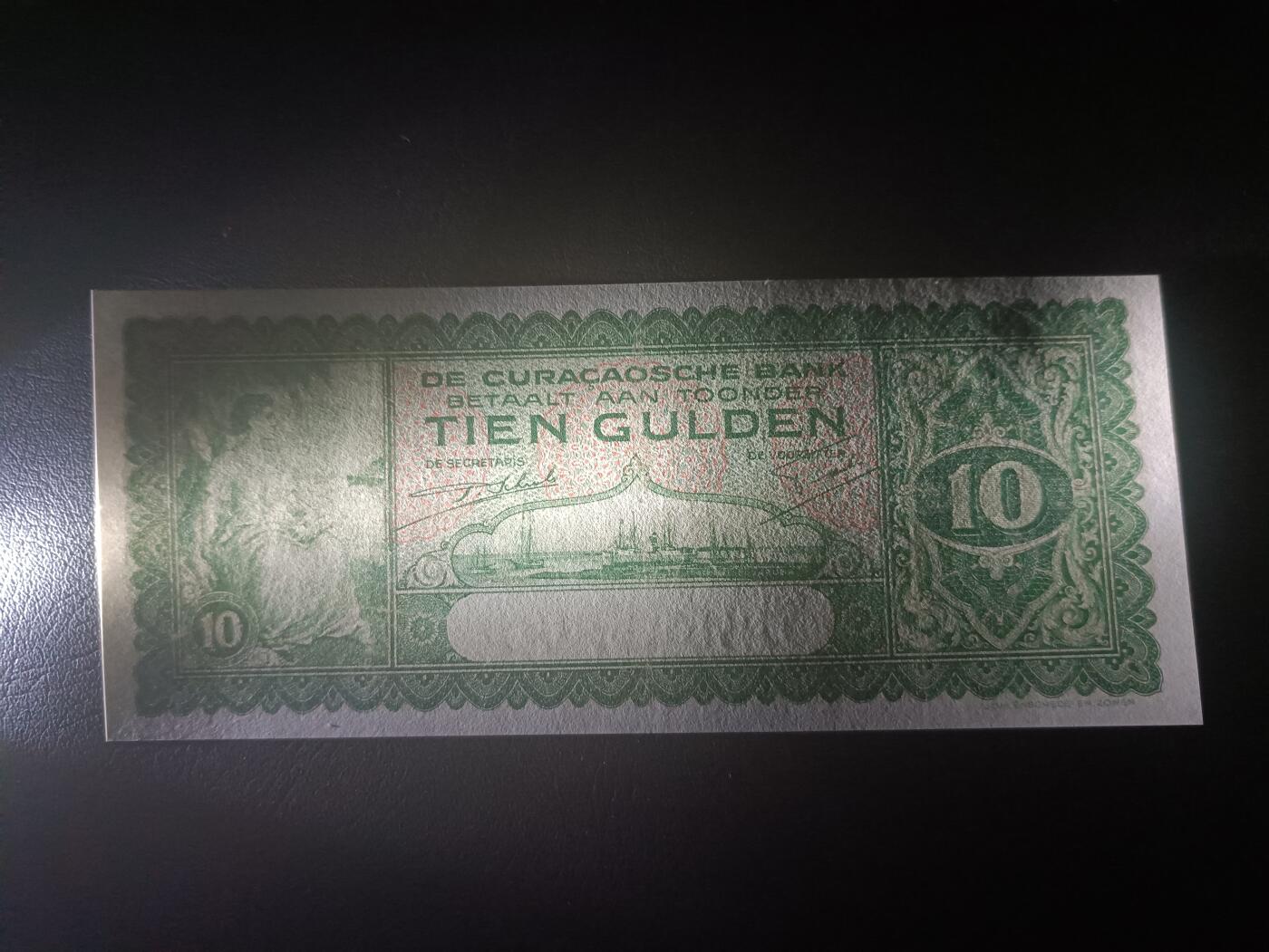 2025十二月第三期，总208期 荷属库拉索1939年10盾流通好品XF，稀有荷属殖民地中高面值品种，库拉索港俯瞰图和女性形象