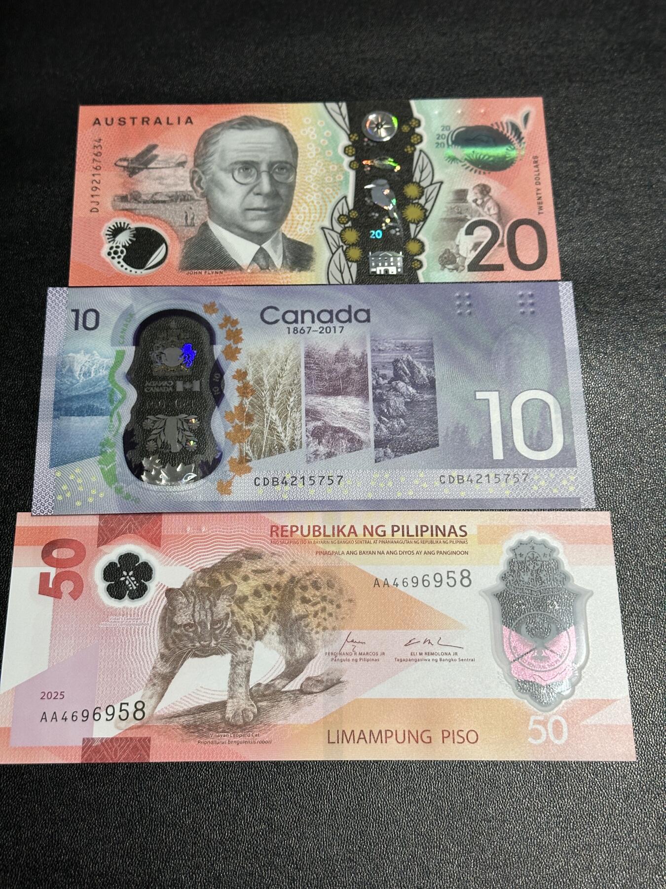 《外钞收藏家》第五百九十三期（精品场）（本平台长期征集拍品、欢迎藏友们联系合作） 澳大利亚20元+加拿大10元+菲律宾50比索 三张一起 全新UNC