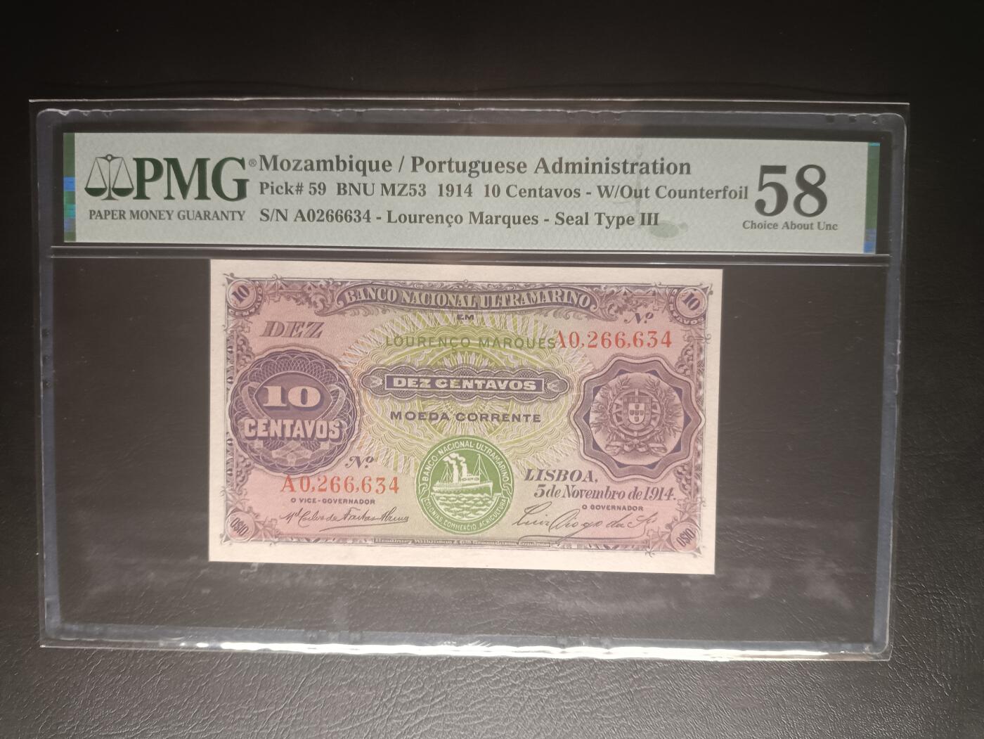 2025十二月第三期，总208期 葡属莫桑比克1914版10分PMG58分，汽船和大西洋银行经典的女神目送船队出海