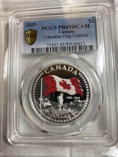 ❤️【币观天下】❤️ 第334期钱币拍卖- 2025.12.12周五晚上6点半场-长期征集拍品 - 2015年 加拿大国旗五十周年纪念彩色国旗银币pcgs-pr69，高分难得