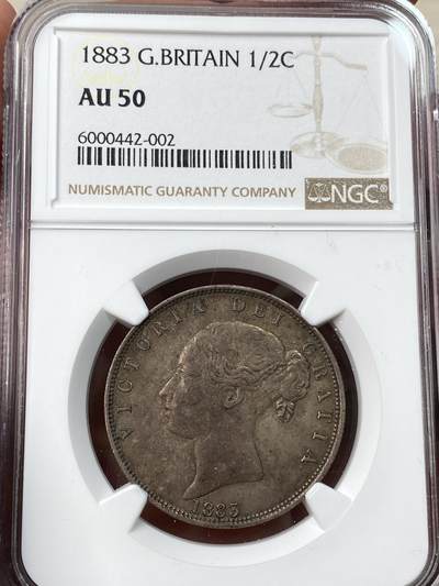 万国钱币拍卖第057期（万国冬季大拍） - NGC AU50 1883年英国维多利亚女皇盾徽版半克朗银币 经典小维少女头 原味酱彩状态舒适