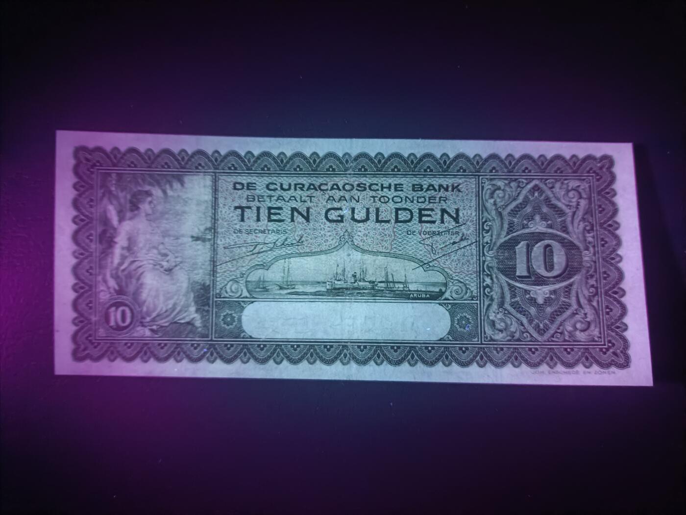 2025十二月第三期，总208期 荷属库拉索1939年10盾流通好品XF，稀有荷属殖民地中高面值品种，库拉索港俯瞰图和女性形象