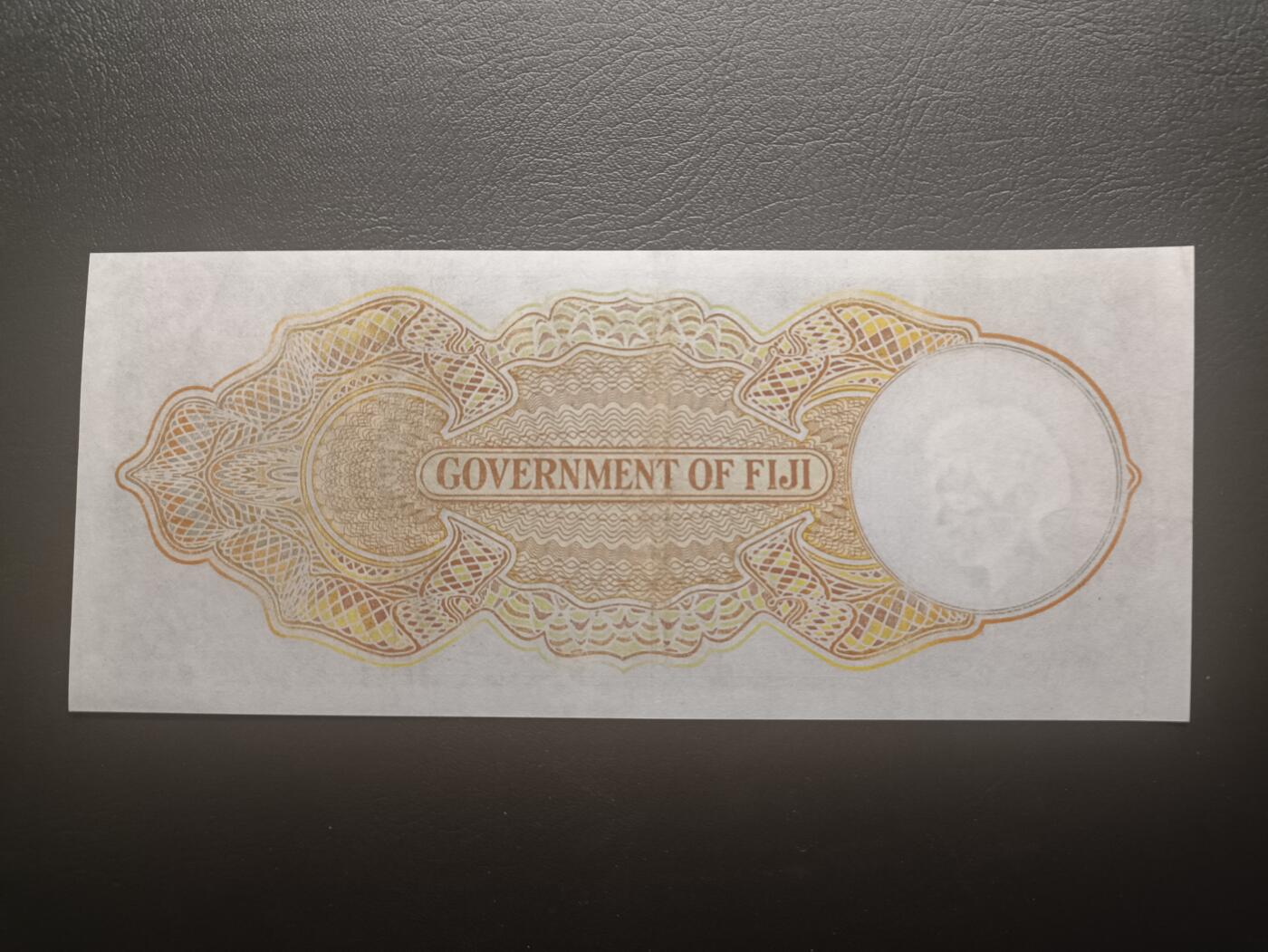 2025十二月第三期，总208期 英属斐济1941年5先令AUNC，稀有的战时乔治六世统治时期中高面值品种，主题是斐济殖民政府徽章以及戎装乔治六世国王肖像