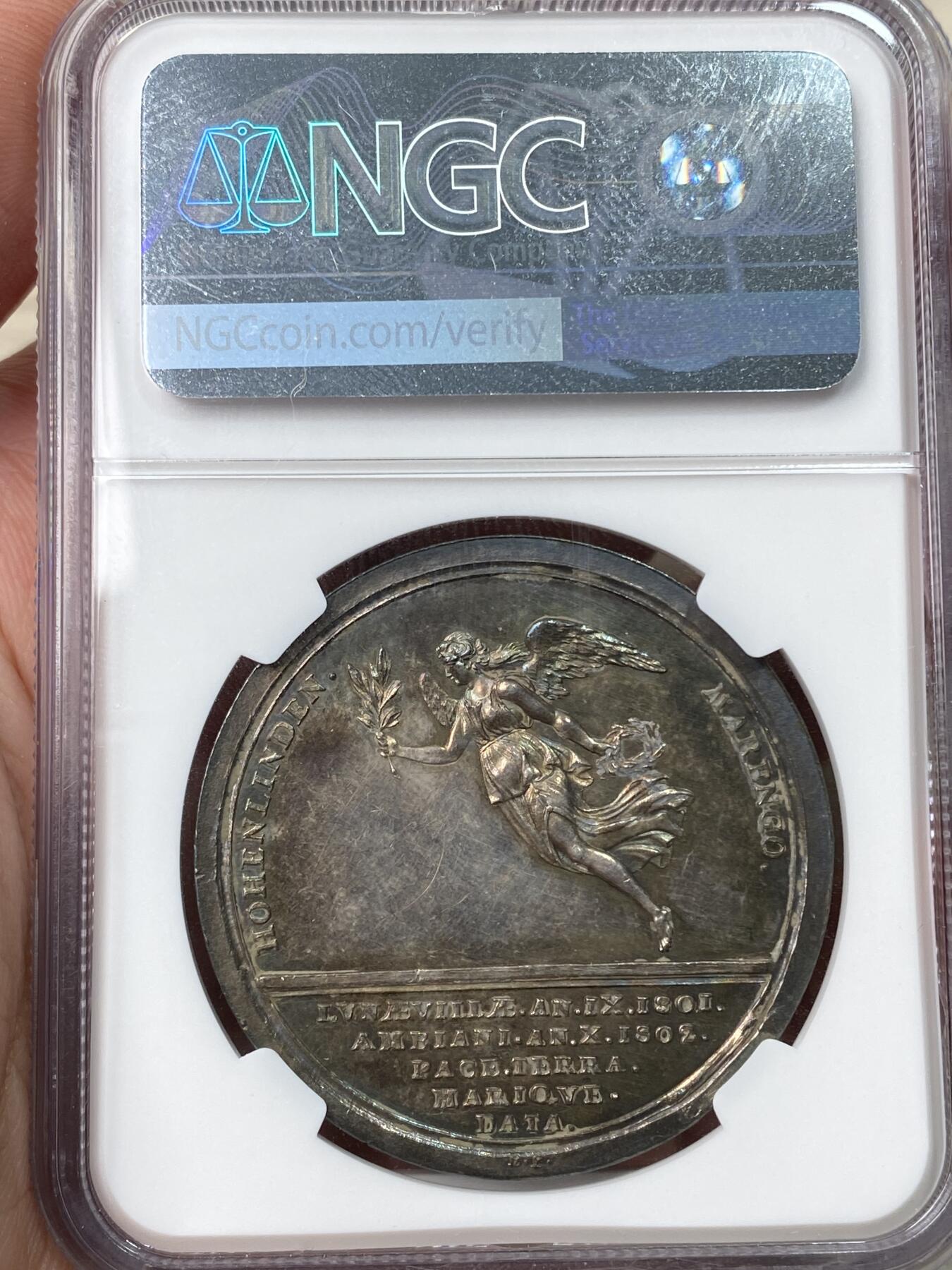 万国钱币拍卖第057期（万国冬季大拍） NGC MS61 1802年法国拿破仑一世纪念法国、英国、西班牙和巴塔维亚共和国之间的亚眠和平大银章 罕见银质火烧云七彩包浆极美收藏品质