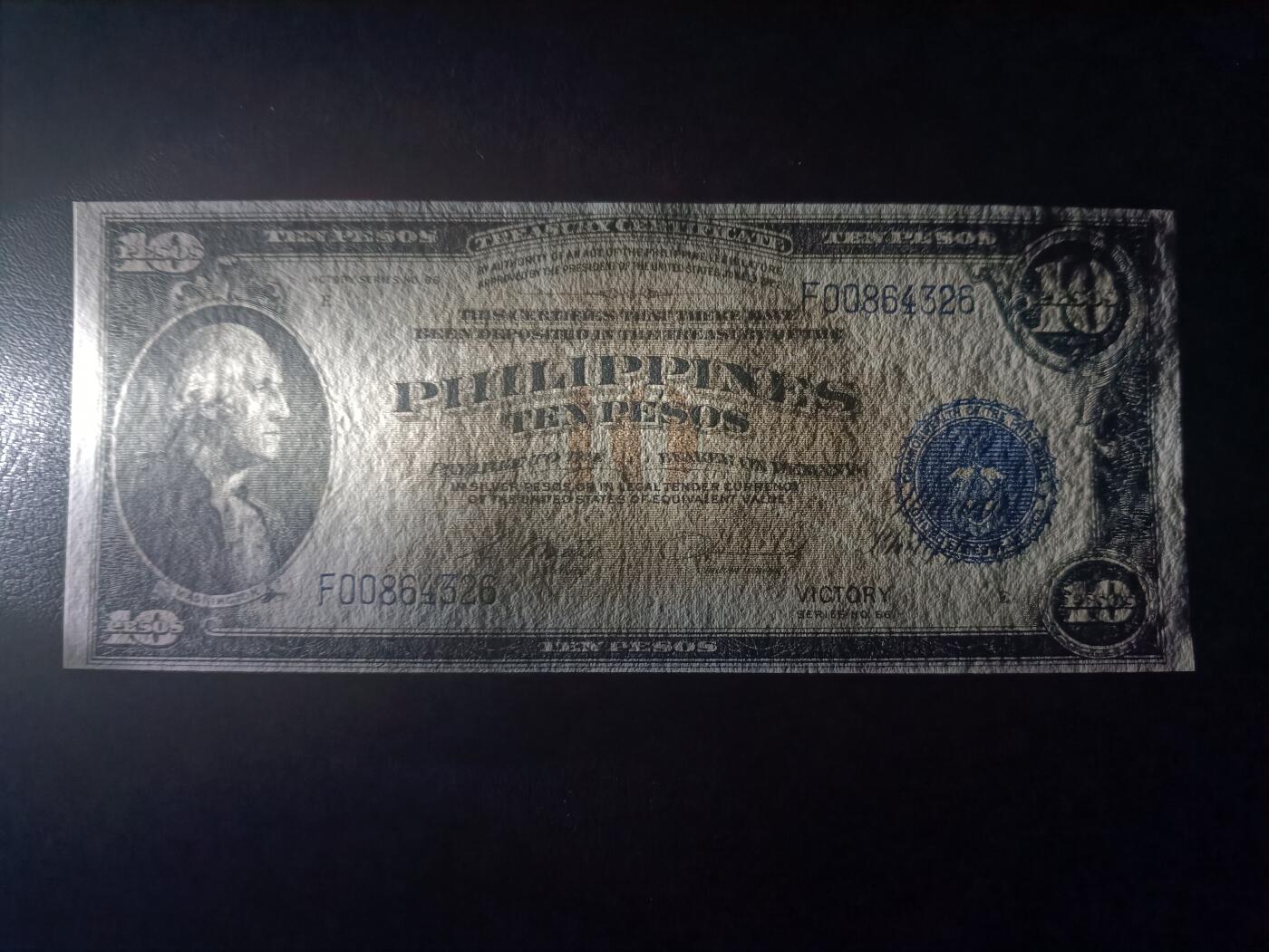 2025十二月第三期，总208期 菲律宾国民银行1944版10比索UNC-，菲律宾光复后在旧有钞票上加盖“胜利”字样，华盛顿侧像，浓厚的美国钞票风格，中高面值印刷较为稀有