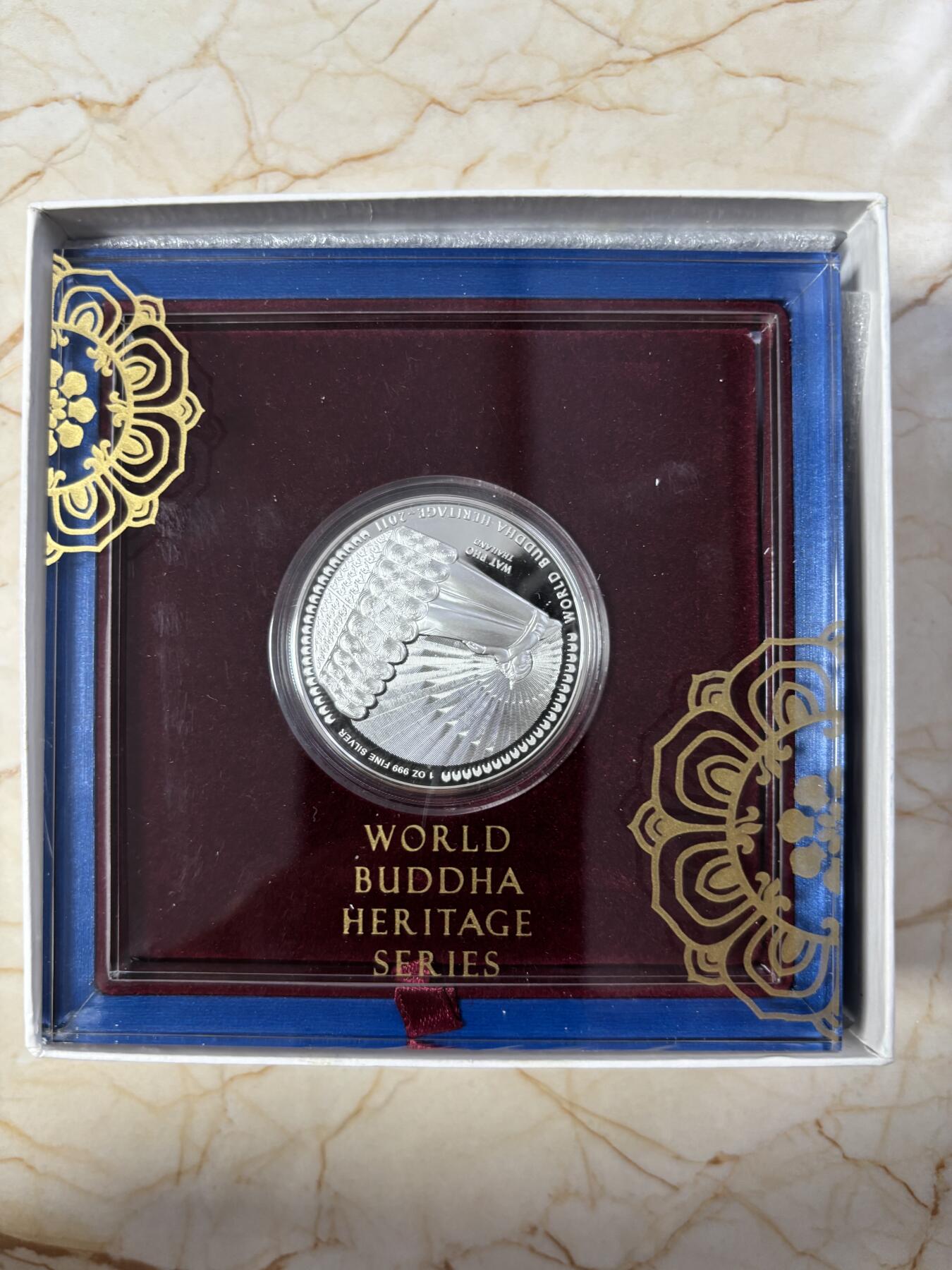 第185期拍卖 不丹2011年世界文化遗产(3)泰国卧佛彩色精制银币，999银，发行量10000枚