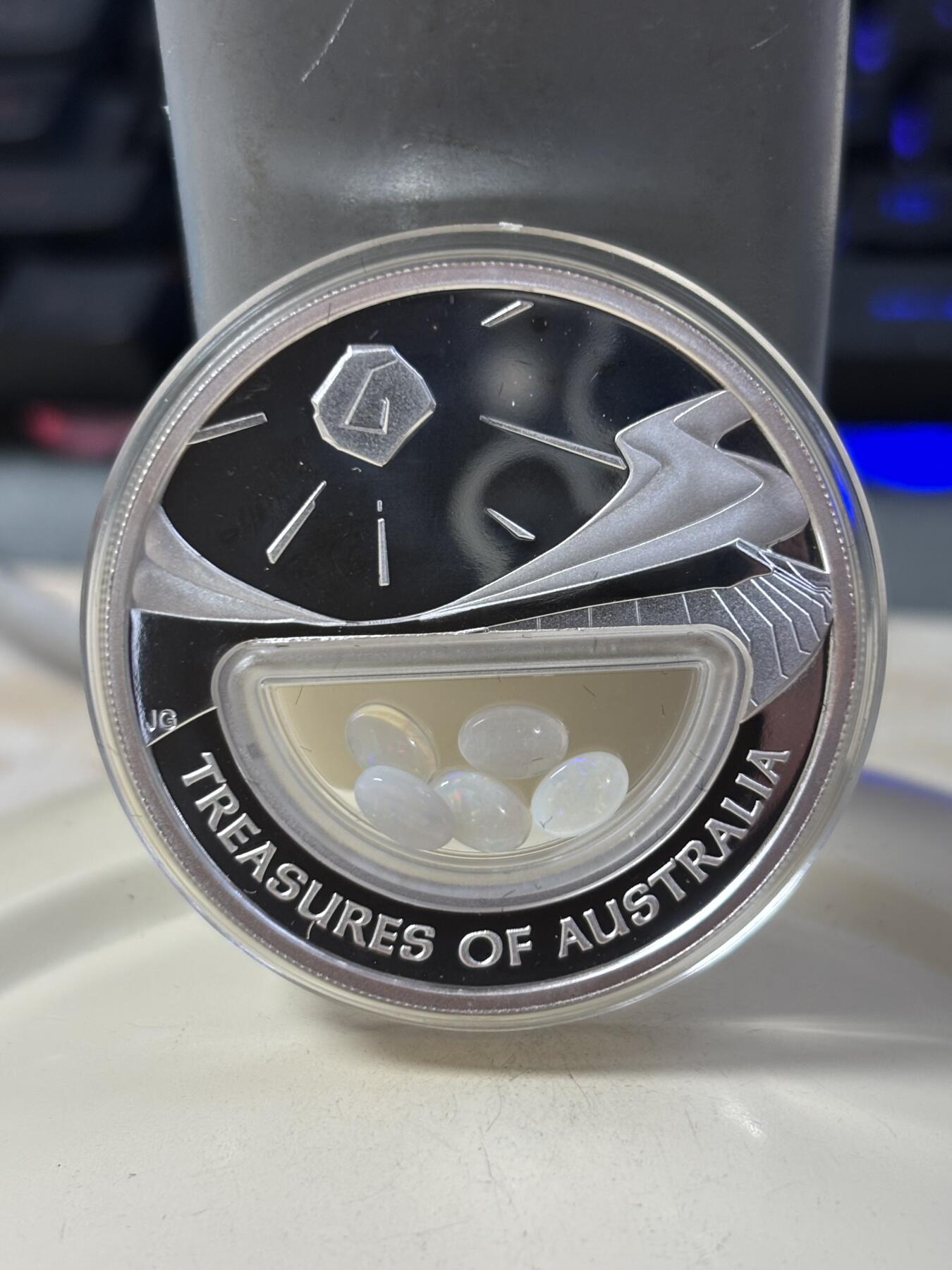 第185期拍卖 澳大利亚2008年澳洲宝藏系列中空镶嵌蛋白石银币，999银，发行7500枚，有氧化