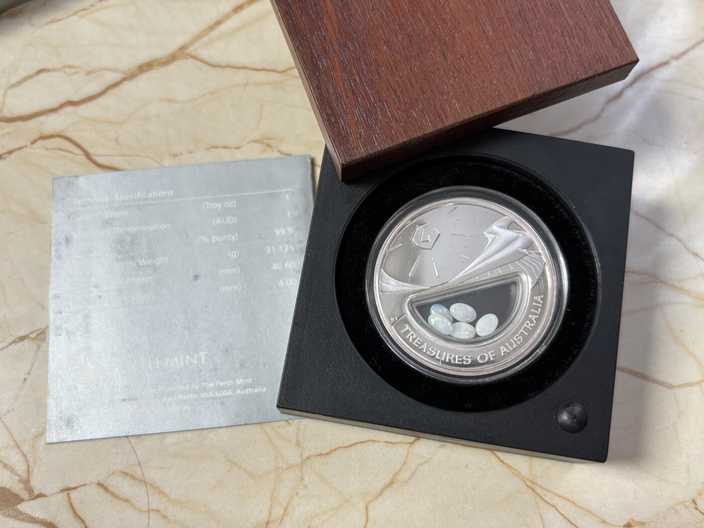 第185期拍卖 澳大利亚2008年澳洲宝藏系列中空镶嵌蛋白石银币，999银，发行7500枚，有氧化