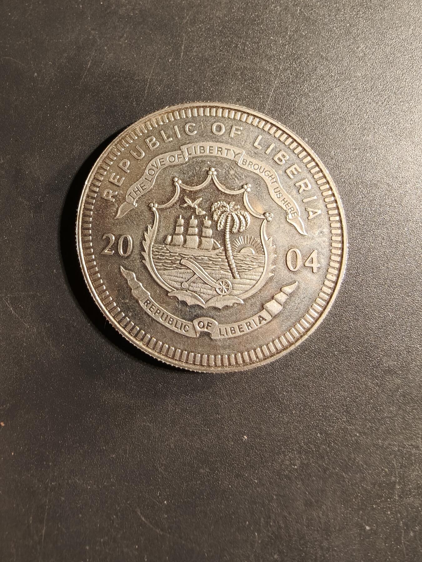 老王徽章第169期 利比里亚共和国发行的面值5美元的纪念币，主题为“新梵蒂冈硬币”    直径40mm.     重量28.5g