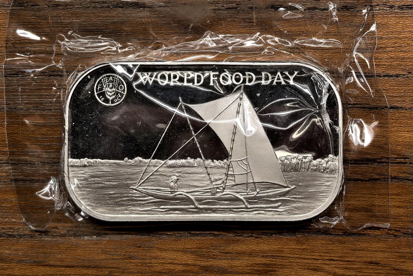 凡希社世界钱币微拍月度大拍（2025/12） 1981汤加FAO世界粮食日PAANGA长方型银币精铸PROOF，品相卓越，有塑封但不确定是否原封。