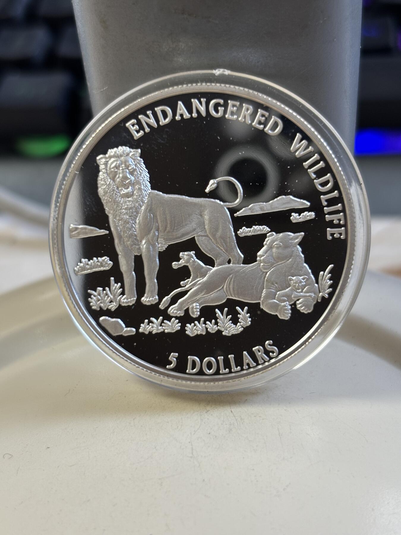 第185期拍卖 库克1996年珍稀动物狮子纪念银币，925银，1盎司