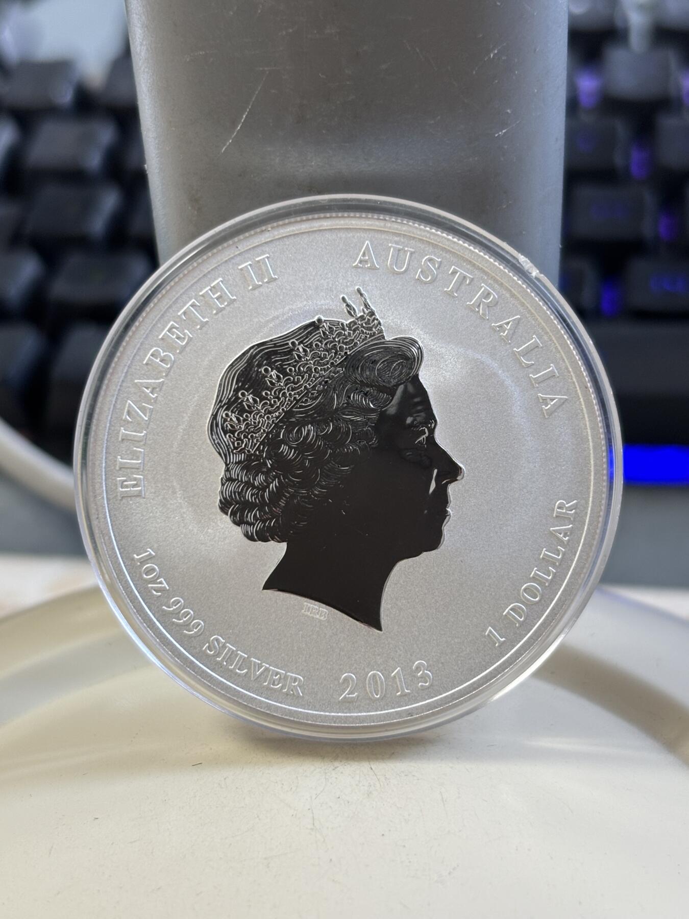 第185期拍卖 澳大利亚2013年十二生肖蛇1盎司纪念银币，999银，塑料盒有瑕疵